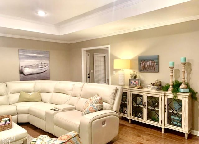 4105 Renee Dr, Jonesboro, AR 72404 - living area with wood finished floors, crown molding, and a raised ceiling