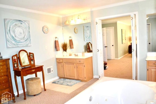 4105 Renee Dr, Jonesboro, AR 72404 - bathroom featuring ornamental molding, vanity, baseboards, and a jetted tub