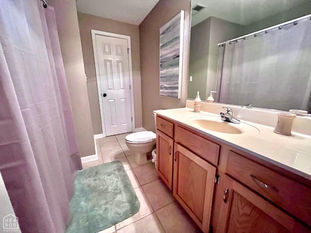 4105 Renee Dr, Jonesboro, AR 72404 - full bathroom featuring toilet, tile patterned flooring, vanity, curtained shower, and baseboards