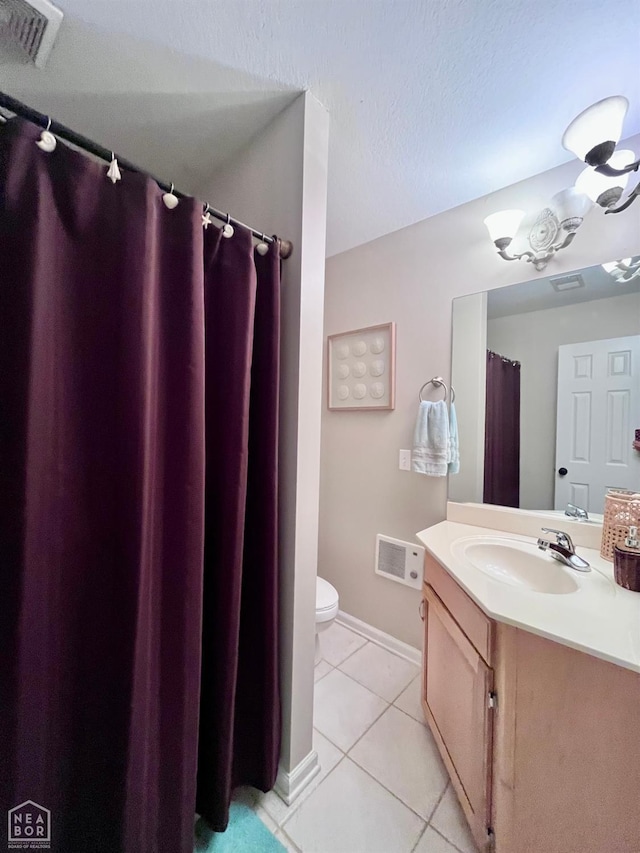 4105 Renee Dr, Jonesboro, AR 72404 - bathroom featuring tile patterned flooring, vanity, toilet, baseboards, and a shower with curtain