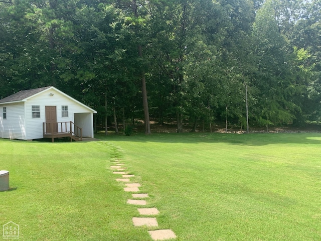 4105 Renee Dr, Jonesboro, AR 72404 - view of green lawn featuring an outdoor structure