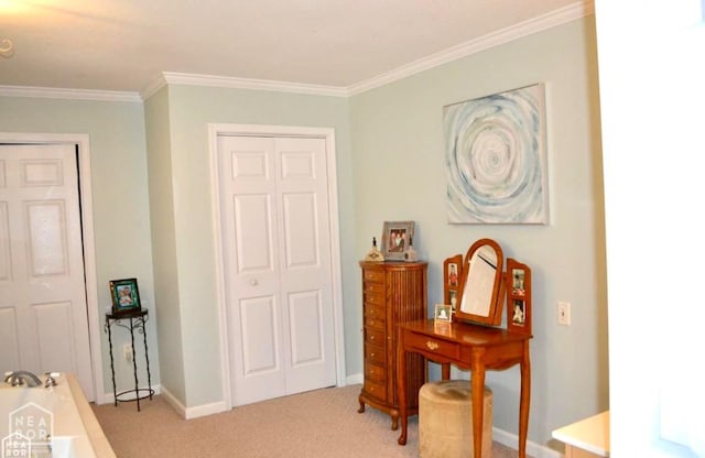 4105 Renee Dr, Jonesboro, AR 72404 - bedroom featuring light carpet, ornamental molding, baseboards, and a closet