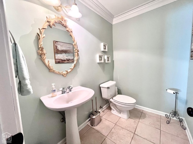 4105 Renee Dr, Jonesboro, AR 72404 - bathroom featuring ornamental molding, toilet, baseboards, and tile patterned floors