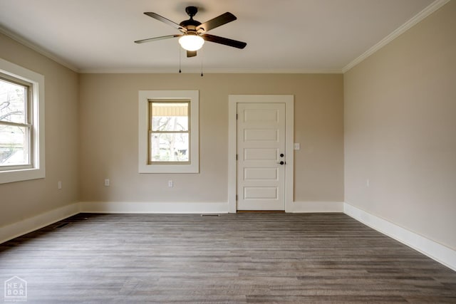 unfurnished room with a ceiling fan, wood finished floors, baseboards, and ornamental molding