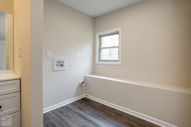 washroom with laundry area, washer hookup, baseboards, and dark wood-style flooring