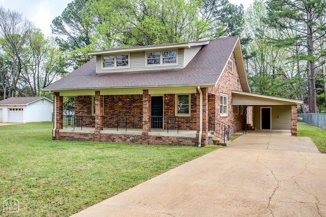 view of front of property featuring roof with shingles, an attached carport, a front yard, brick siding, and covered porch