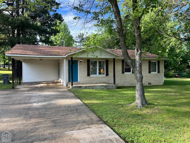 4903 Wise St, Paragould, AR 72450 - ranch-style house featuring crawl space, concrete driveway, brick siding, and a front lawn