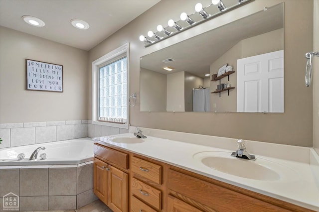 2105 Quarry Cv, Jonesboro, AR 72404 - full bathroom with a bath, double vanity, and tile patterned floors
