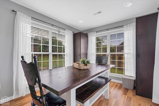 2105 Quarry Cv, Jonesboro, AR 72404 - dining space with light wood-style flooring, baseboards, and recessed lighting