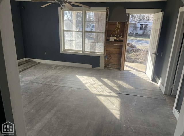 interior space featuring a ceiling fan