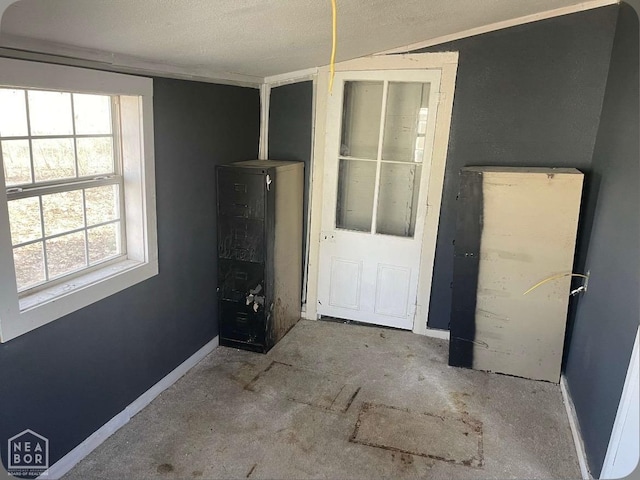 empty room with baseboards