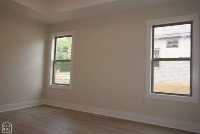1814 N Oak, Brookland, AR 72417 - empty room featuring baseboards and wood finished floors