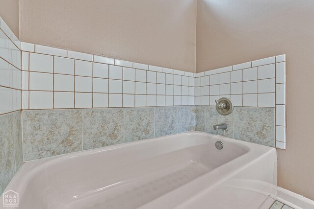 616 Greene 326 Rd, Jonesboro, AR 72401 - full bathroom featuring a bath and baseboards