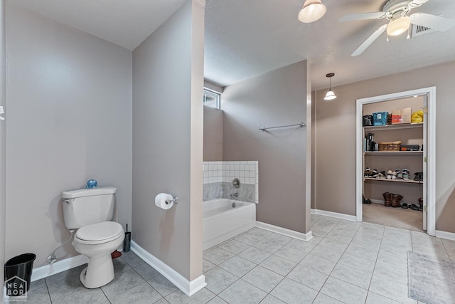 616 Greene 326 Rd, Jonesboro, AR 72401 - full bathroom with a garden tub, ceiling fan, tile patterned flooring, toilet, and baseboards
