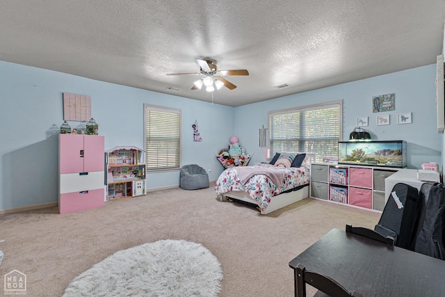 616 Greene 326 Rd, Jonesboro, AR 72401 - carpeted bedroom with visible vents, ceiling fan, baseboards, and a textured ceiling