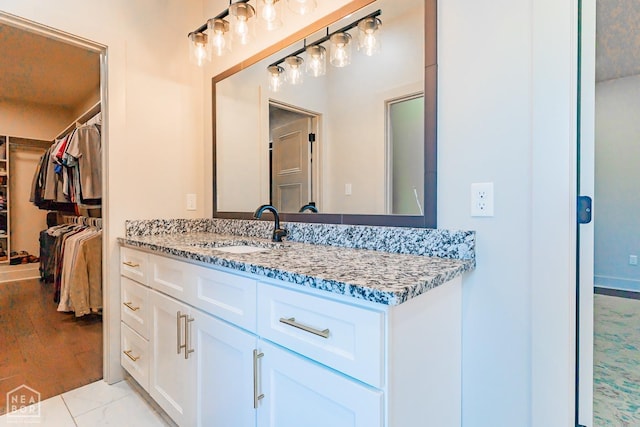 4049 Hwy 351, Jonesboro, AR 72405 - bathroom with vanity and a walk in closet