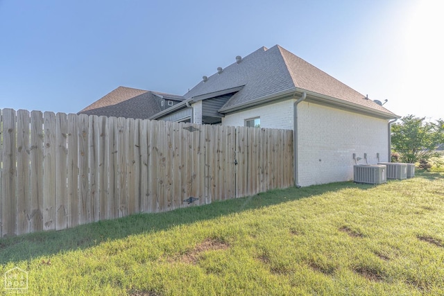 4049 Hwy 351, Jonesboro, AR 72405 - view of property exterior featuring a shingled roof, brick siding, fence, and a yard