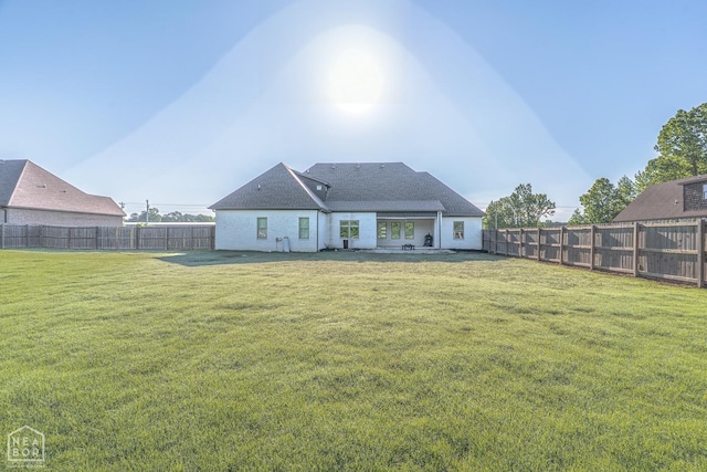 4049 Hwy 351, Jonesboro, AR 72405 - rear view of house featuring a yard and a fenced backyard
