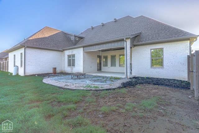 4049 Hwy 351, Jonesboro, AR 72405 - rear view of property with brick siding, roof with shingles, and a patio