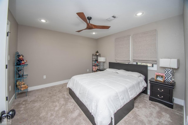 carpeted bedroom featuring recessed lighting, visible vents, and baseboards