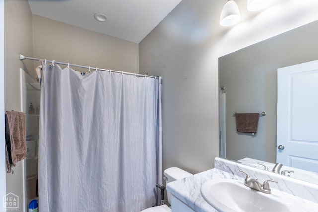 3620 Leafy Pass, Jonesboro, AR 72404 - full bathroom featuring vanity, toilet, and a shower with curtain