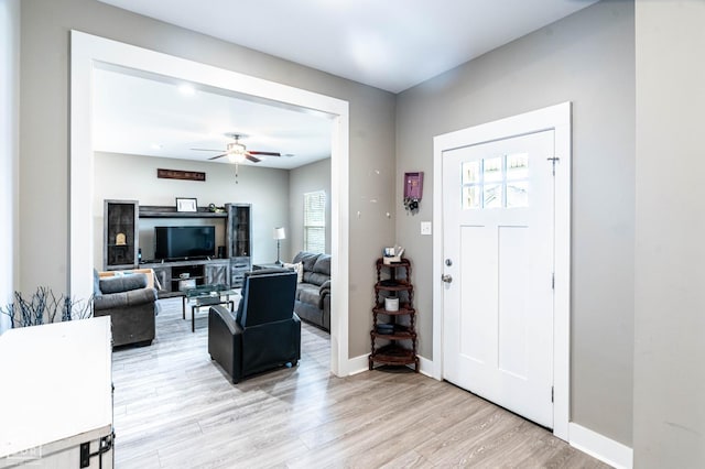 3620 Leafy Pass, Jonesboro, AR 72404 - entrance foyer with ceiling fan, light wood-type flooring, and baseboards