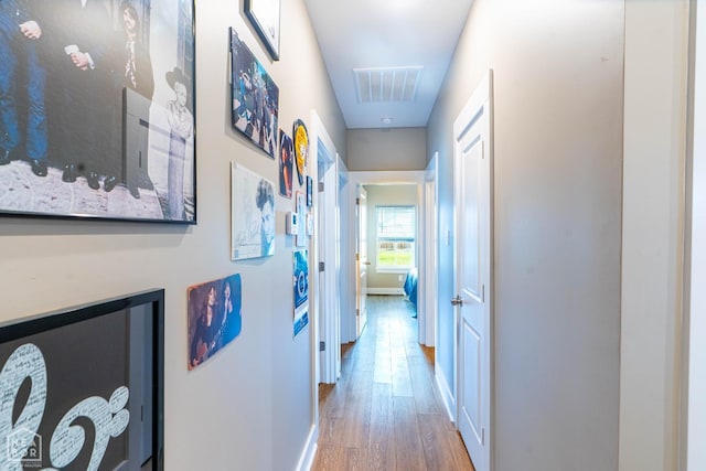 3620 Leafy Pass, Jonesboro, AR 72404 - corridor with wood finished floors and baseboards