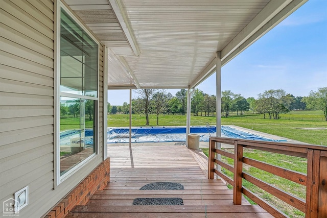 wooden deck with a yard