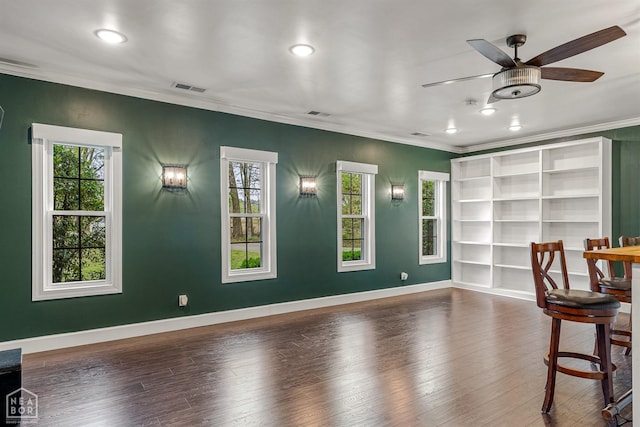 unfurnished room with ornamental molding, recessed lighting, visible vents, ceiling fan, and wood finished floors
