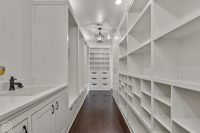 interior space with a sink and visible vents