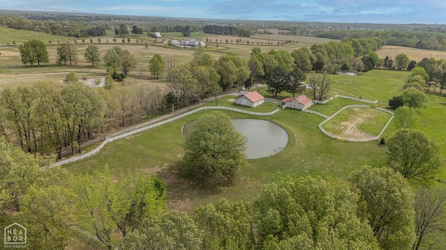 drone / aerial view featuring a water view and a rural view
