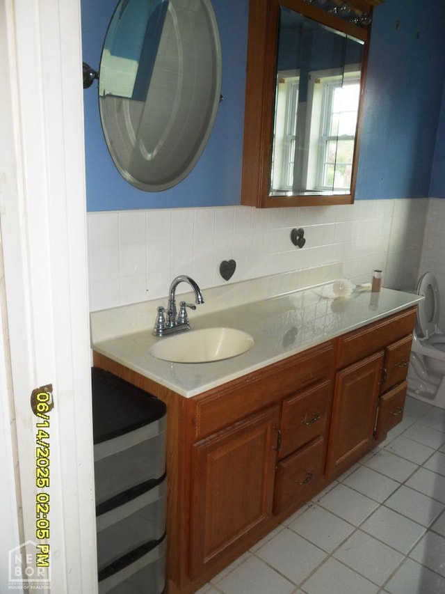 805 Cherokee Dr, Newport, AR 72112 - bathroom with vanity, tile patterned floors, and tile walls