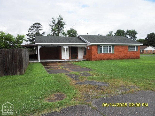 805 Cherokee Dr, Newport, AR 72112 - ranch-style house with driveway, a carport, and brick siding