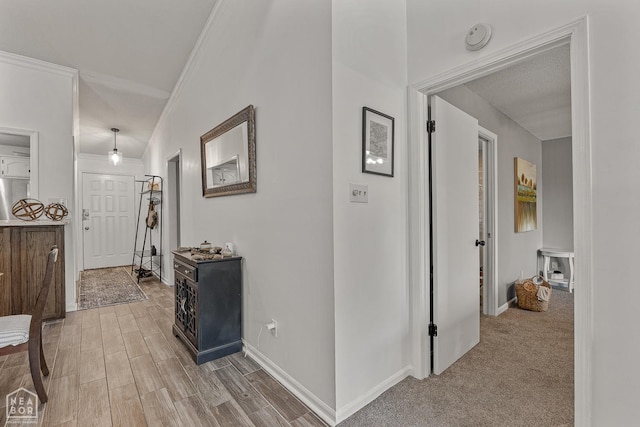 1300 S Church St S, Jonesboro, AR 72401 - corridor with baseboards, ornamental molding, and light wood-type flooring