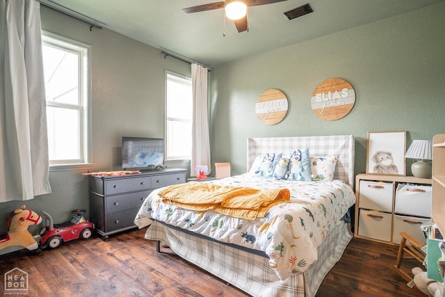2 Deer Run, Clarksville, AR 72830 - bedroom featuring wood finished floors, multiple windows, and a ceiling fan
