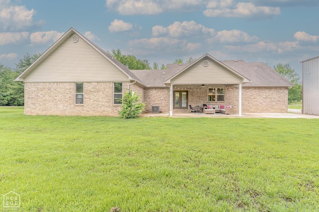 2 Deer Run, Clarksville, AR 72830 - back of house featuring an outdoor living space, a lawn, a patio, and brick siding