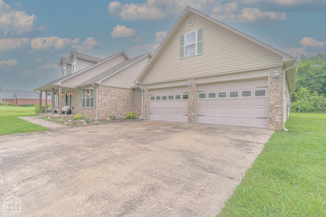 2 Deer Run, Clarksville, AR 72830 - view of front of home featuring brick siding, concrete driveway, and a front lawn