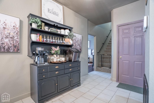 2 Deer Run, Clarksville, AR 72830 - bar with stairway and light tile patterned floors