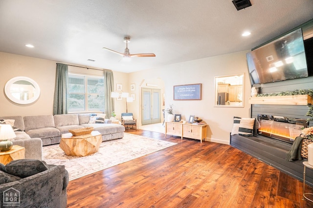 2 Deer Run, Clarksville, AR 72830 - living room with ceiling fan, wood finished floors, recessed lighting, and a glass covered fireplace