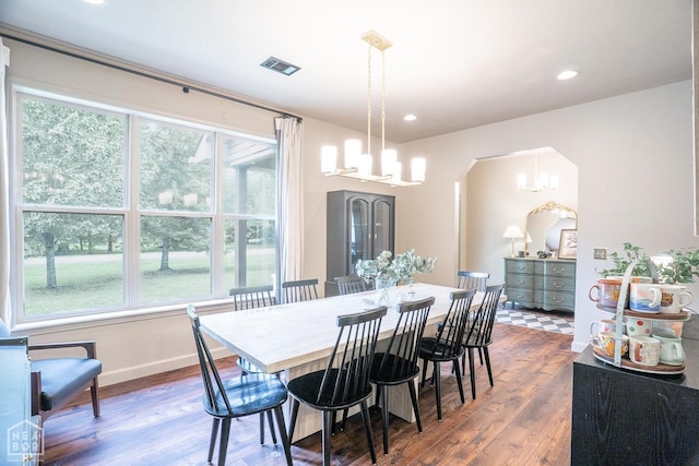 2 Deer Run, Clarksville, AR 72830 - dining area featuring a chandelier, healthy amount of natural light, dark wood-style floors, recessed lighting, and arched walkways