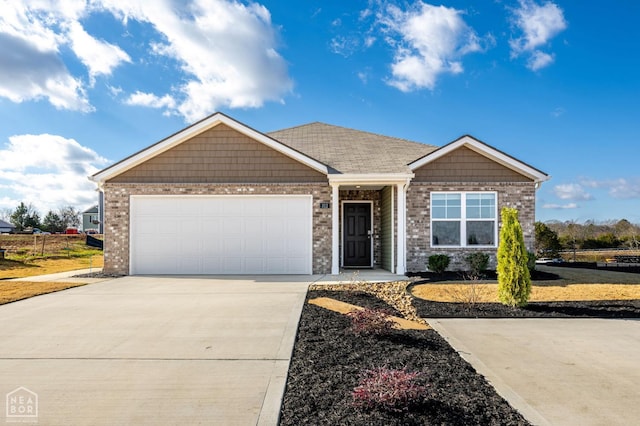 107 Terry Dr, Brookland, AR 72417 - ranch-style home featuring driveway, a garage, and brick siding