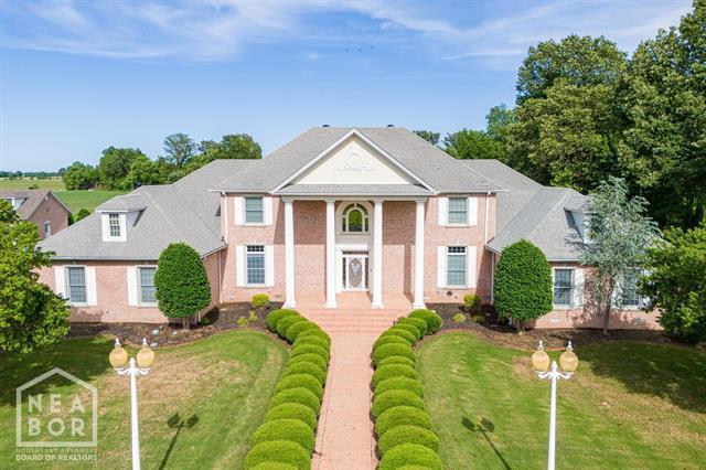 3201 S 2nd Ave S, Paragould, AR 72450 - greek revival inspired property with a front yard