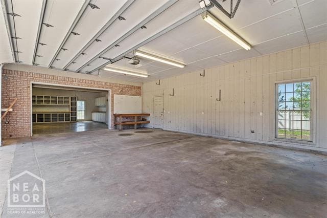 3201 S 2nd Ave S, Paragould, AR 72450 - garage featuring a garage door opener
