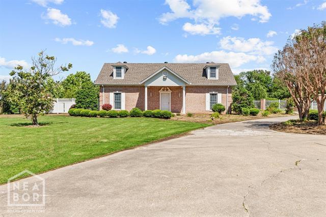 3201 S 2nd Ave S, Paragould, AR 72450 - view of front of home featuring brick siding