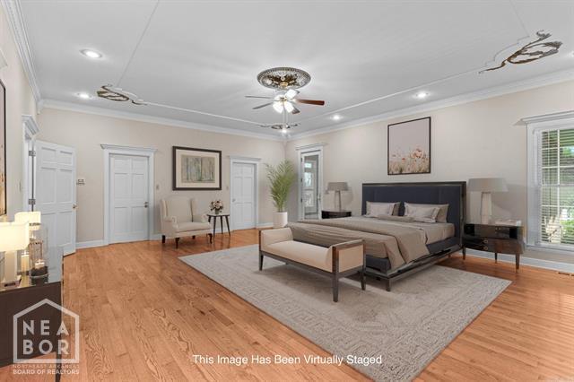 3201 S 2nd Ave S, Paragould, AR 72450 - bedroom featuring crown molding, light wood-style floors, and recessed lighting