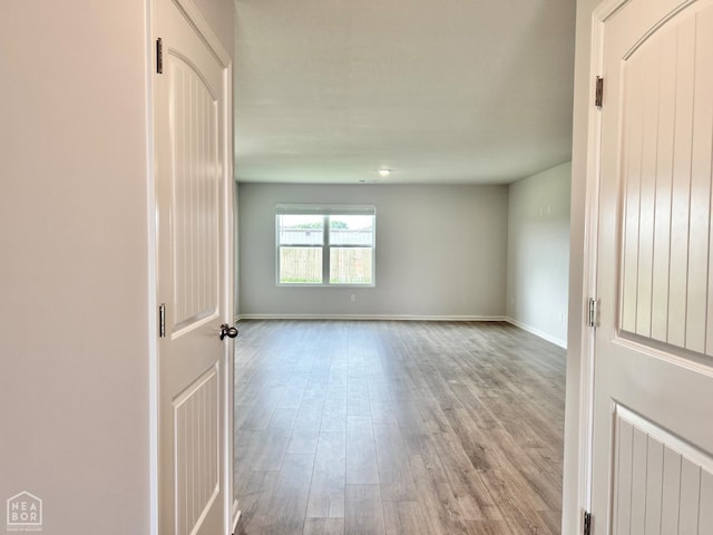119 Terry Dr, Brookland, AR 72417 - spare room featuring wood finished floors and baseboards