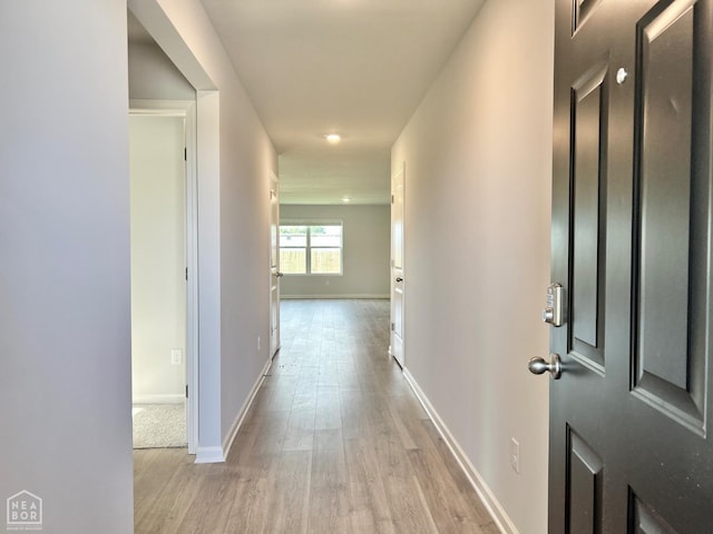119 Terry Dr, Brookland, AR 72417 - hall with wood finished floors and baseboards