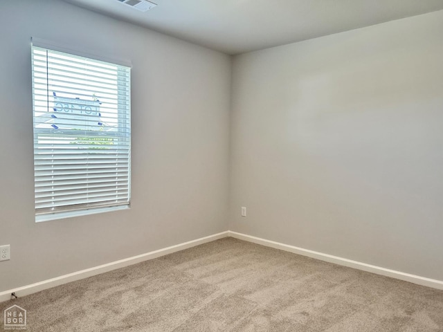 119 Terry Dr, Brookland, AR 72417 - carpeted spare room featuring baseboards