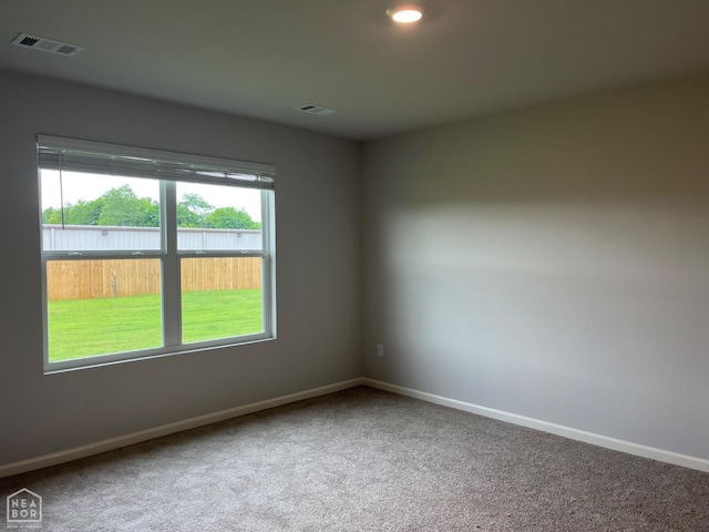 119 Terry Dr, Brookland, AR 72417 - carpeted spare room featuring baseboards