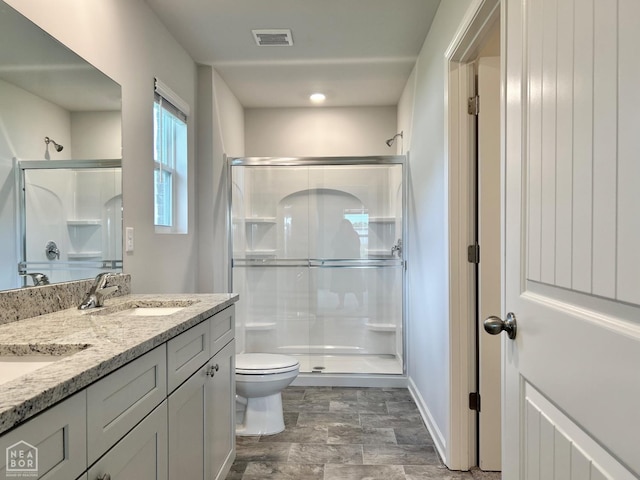 119 Terry Dr, Brookland, AR 72417 - bathroom featuring a shower stall and double vanity